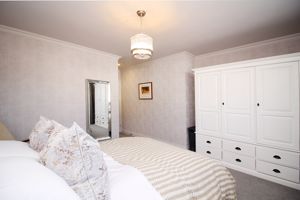 Bedroom One- click for photo gallery